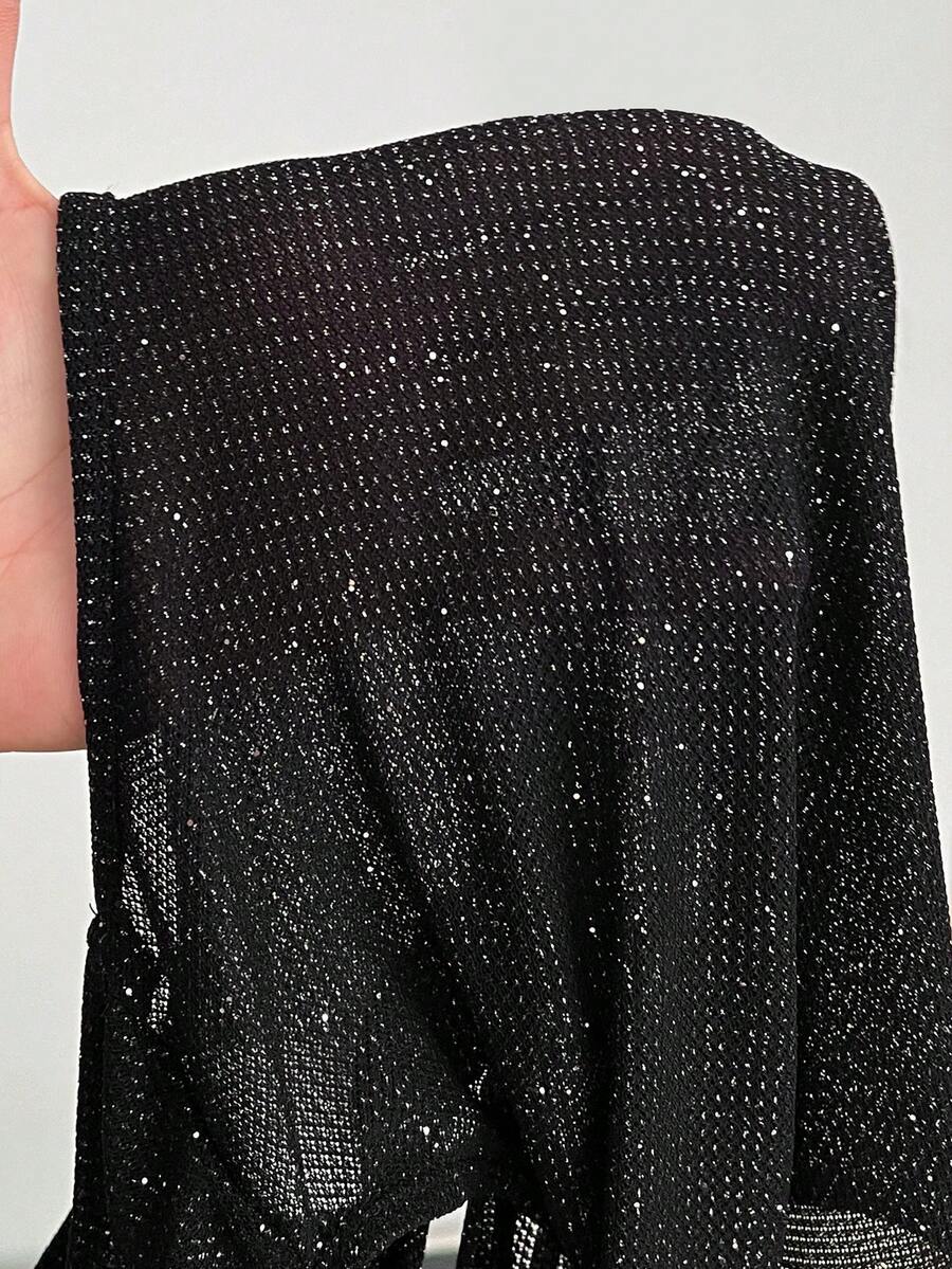Women's slim fit sleeveless bodysuit with a stand collar and crisscross backless design in coated fabric.