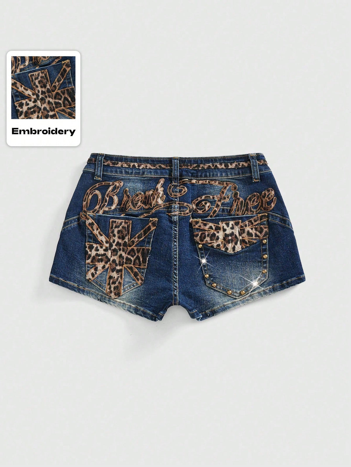 Women's super low waist shorts with leopard print embroidery, button and zipper closure, and raw hem detailing.
