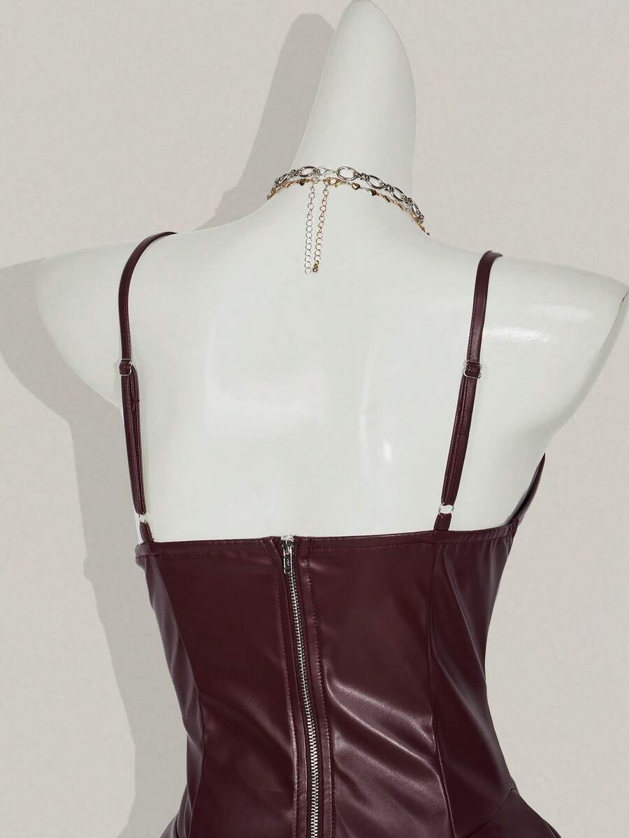 Women's Y2K PU leather mini dress with spaghetti straps, V-neckline, backless design, zipper closure, high waist, slim A-line fit, and layered tiered hem.