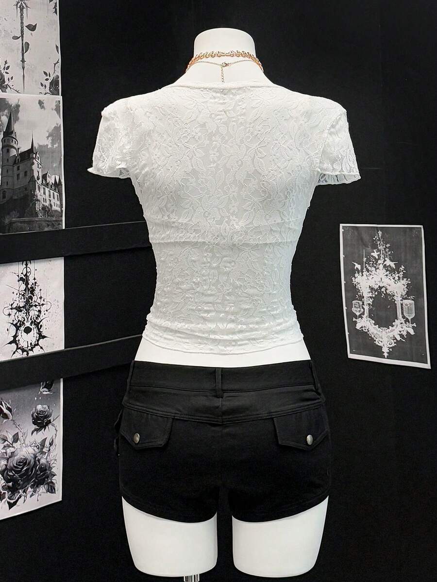 Women's semi-sheer deep V-neck top featuring cap sleeves, contrast lace trimming, and a lace-up front detail.