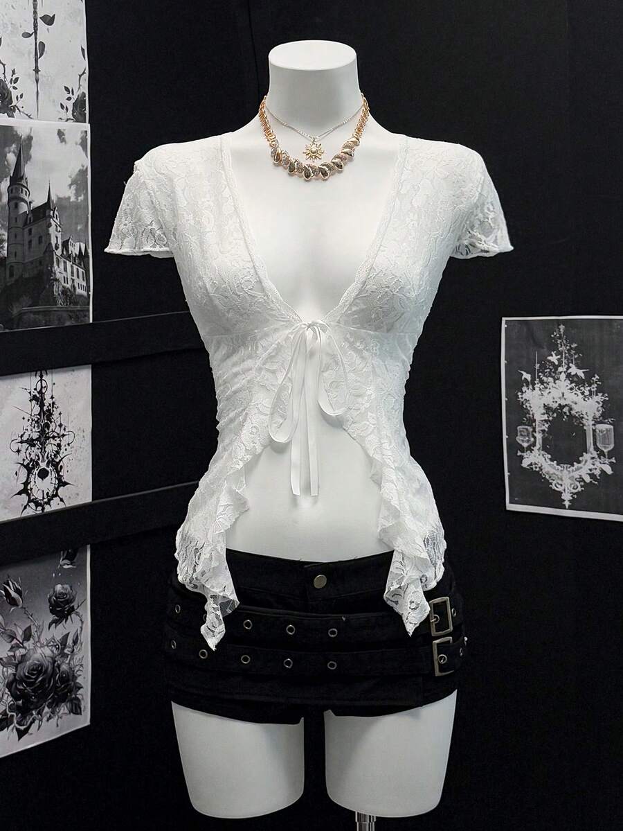 Women's semi-sheer deep V-neck top featuring cap sleeves, contrast lace trimming, and a lace-up front detail.