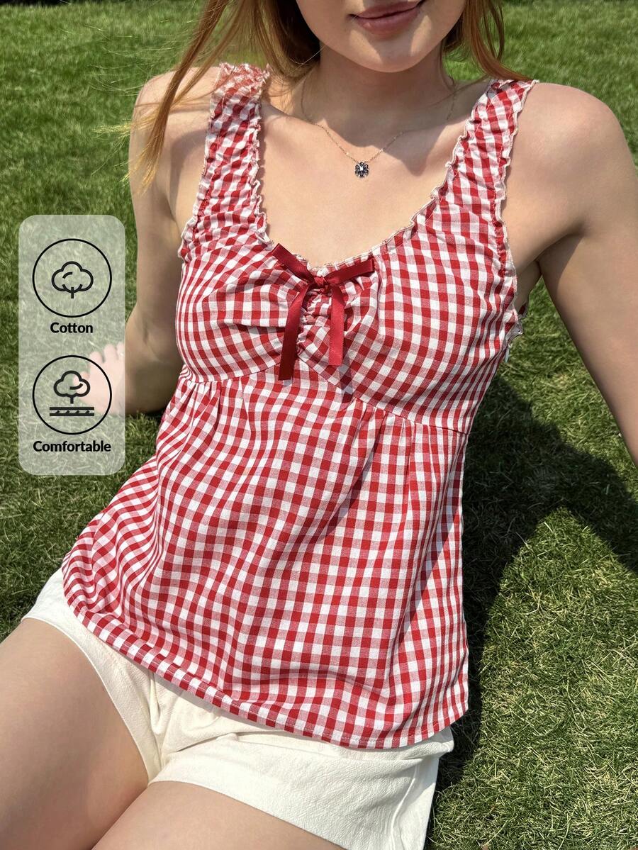 Women's red gingham smocked tank top with scoop neck, ruffle hem, and bow knot detail