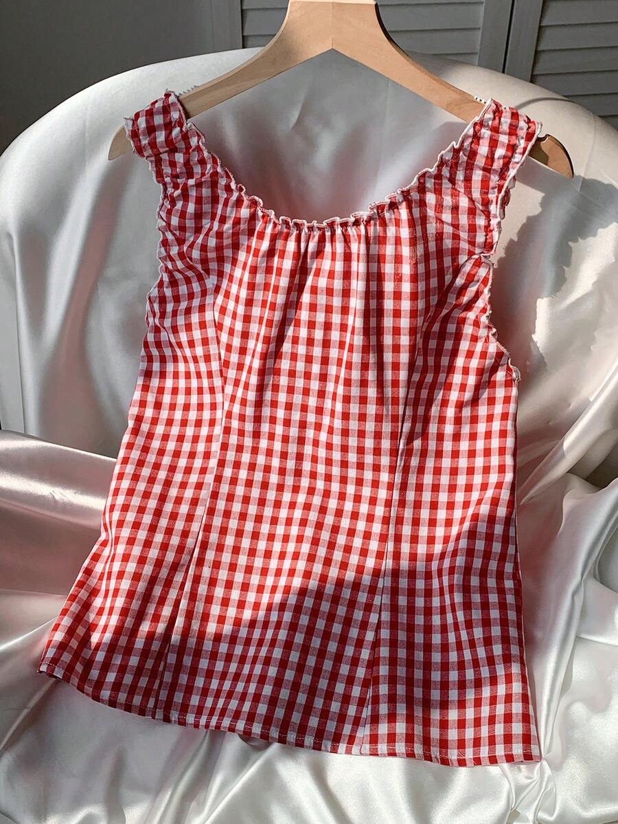 Women's red gingham smocked tank top with scoop neck, ruffle hem, and bow knot detail