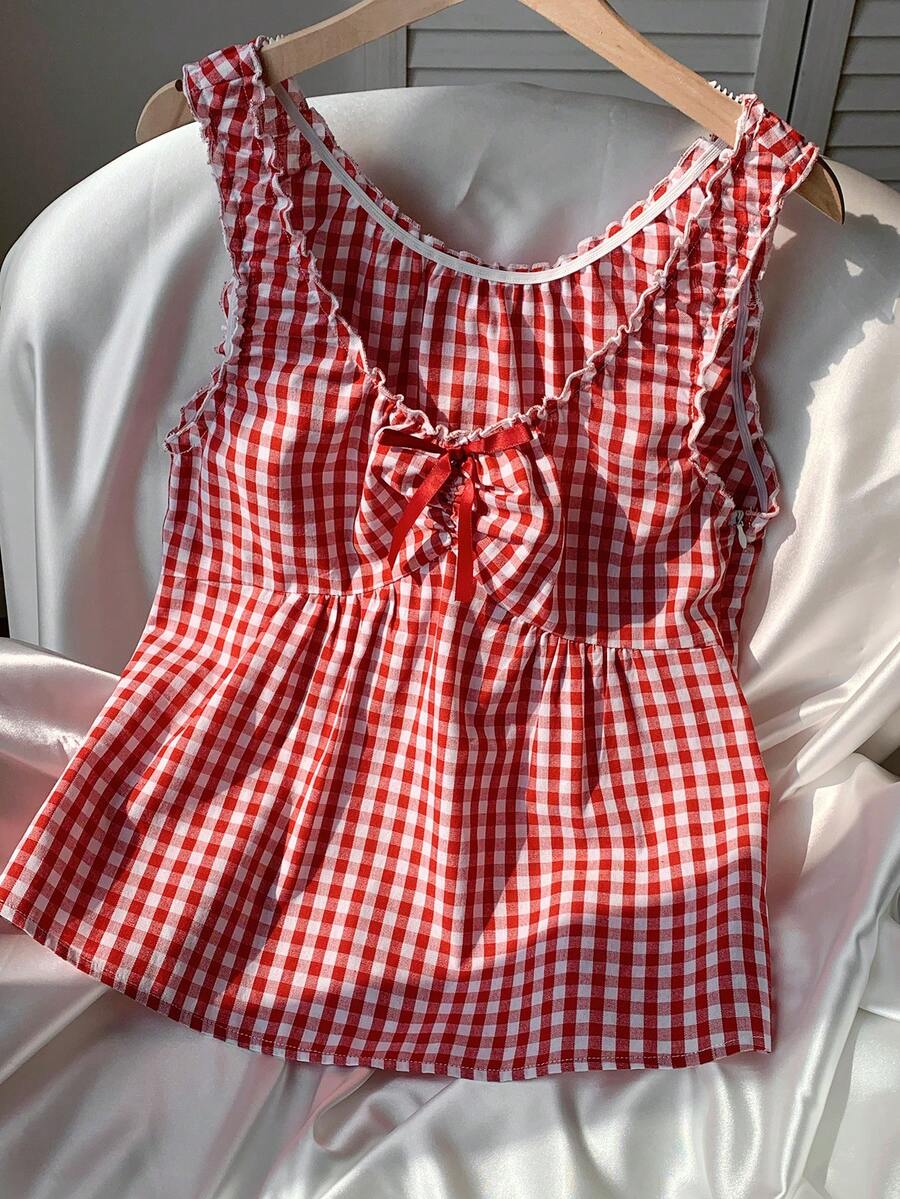 Women's red gingham smocked tank top with scoop neck, ruffle hem, and bow knot detail