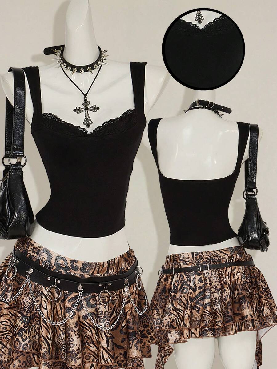 Black sleeveless crop cami top with wide straps, contrast lace trim, rib-knit texture, slim fit, and regular hem