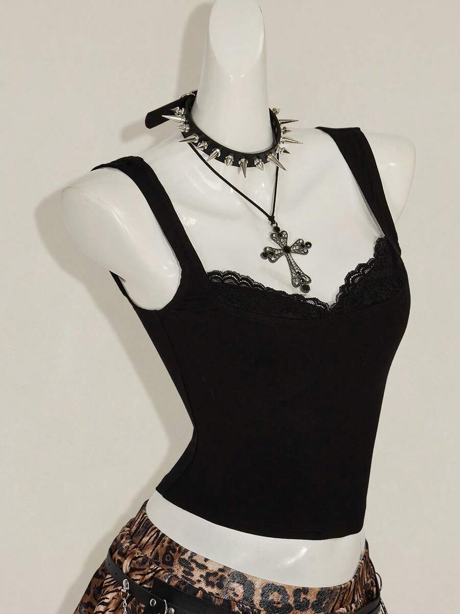 Black sleeveless crop cami top with wide straps, contrast lace trim, rib-knit texture, slim fit, and regular hem
