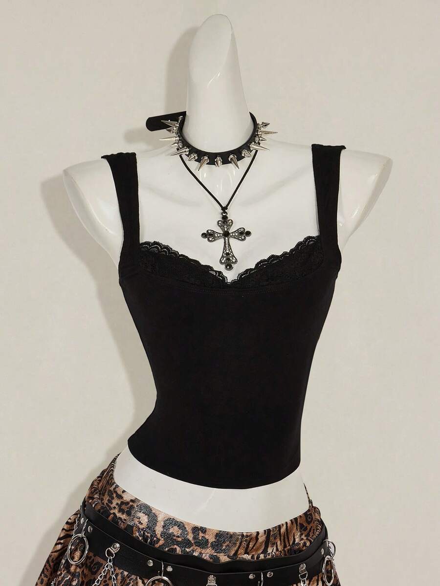 Black sleeveless crop cami top with wide straps, contrast lace trim, rib-knit texture, slim fit, and regular hem