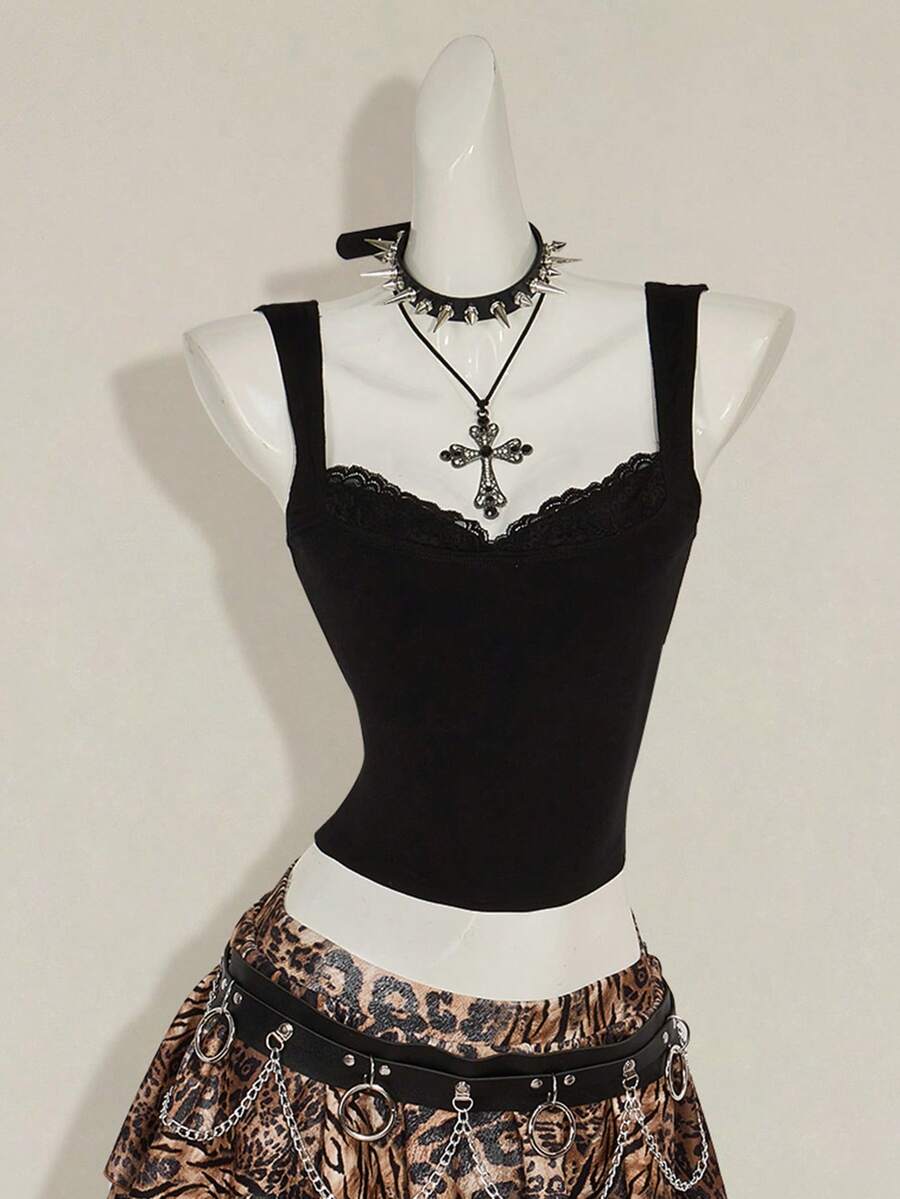 Black sleeveless crop cami top with wide straps, contrast lace trim, rib-knit texture, slim fit, and regular hem