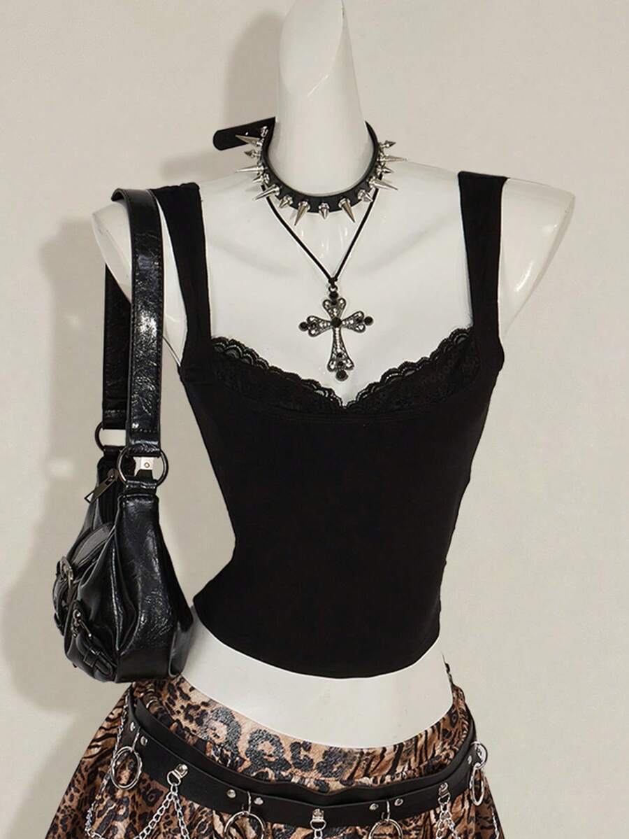 Black sleeveless crop cami top with wide straps, contrast lace trim, rib-knit texture, slim fit, and regular hem