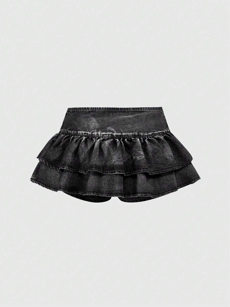 Y2K ultra low waist mini skirt with tiered layer detail, ruffle hem, zipper closure, straight silhouette, and fabric.