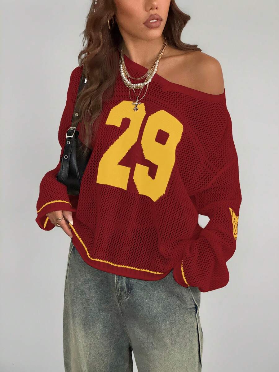 Women's oversized long sleeve knit pullover sweater with round neck, drop shoulder design, and front pocket detail.