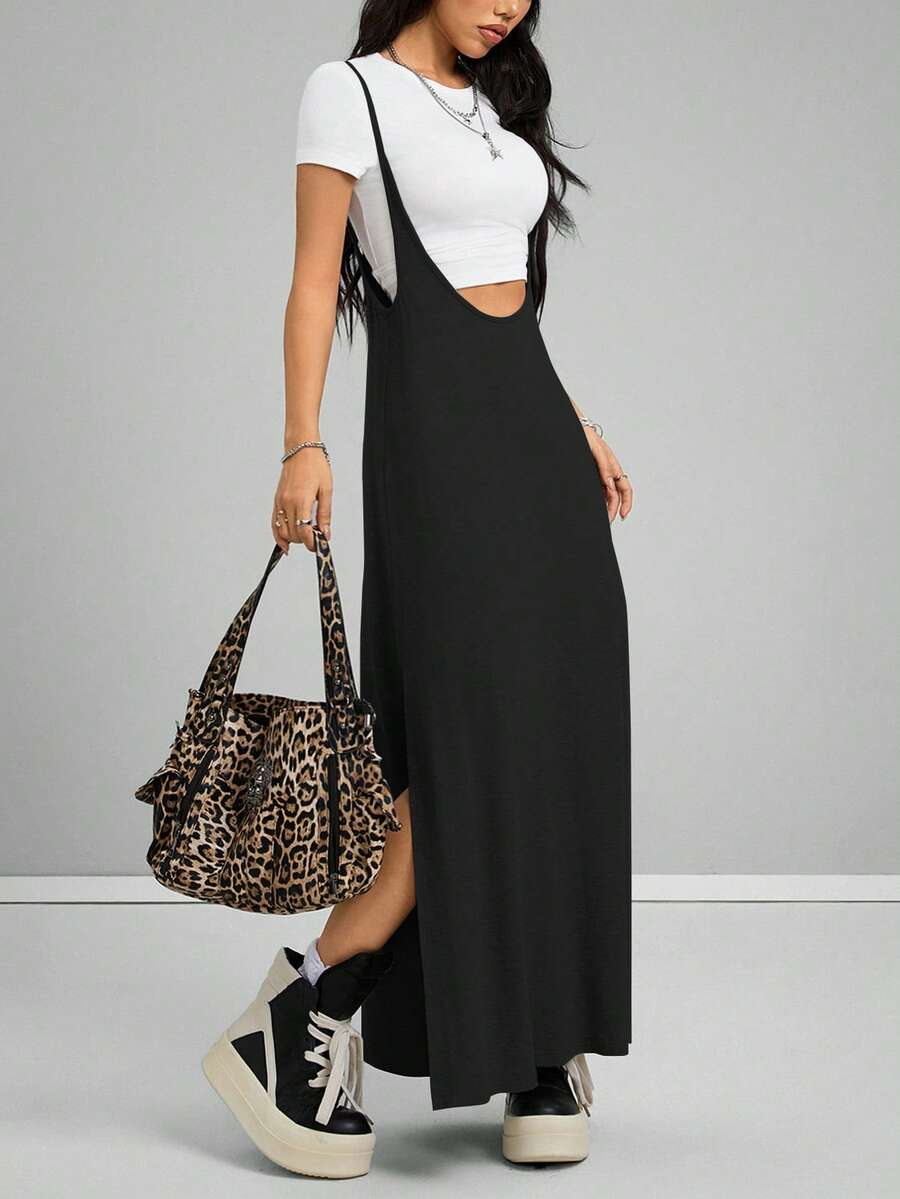Sleeveless black cami maxi dress with spaghetti straps, textured knitted fabric, and a high thigh slit for women.