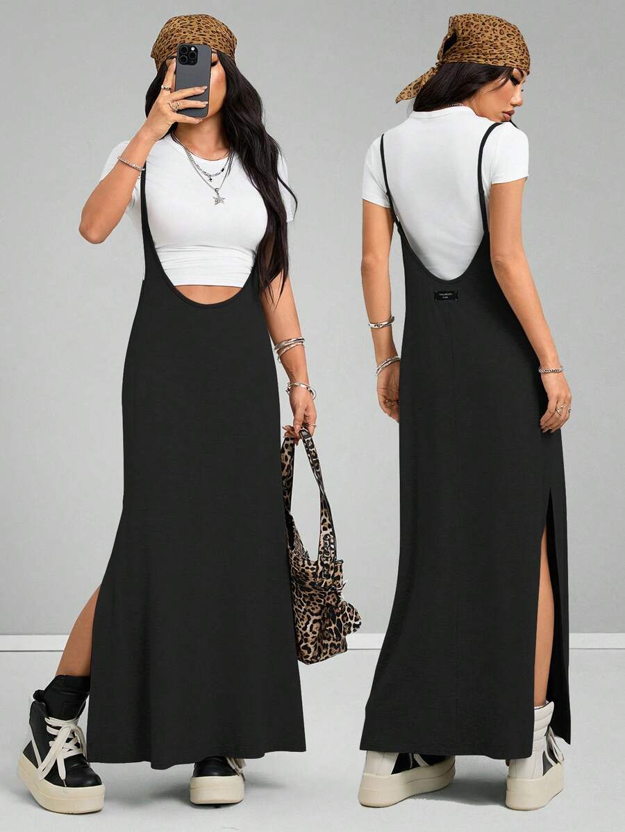 Sleeveless black cami maxi dress with spaghetti straps, textured knitted fabric, and a high thigh slit for women.