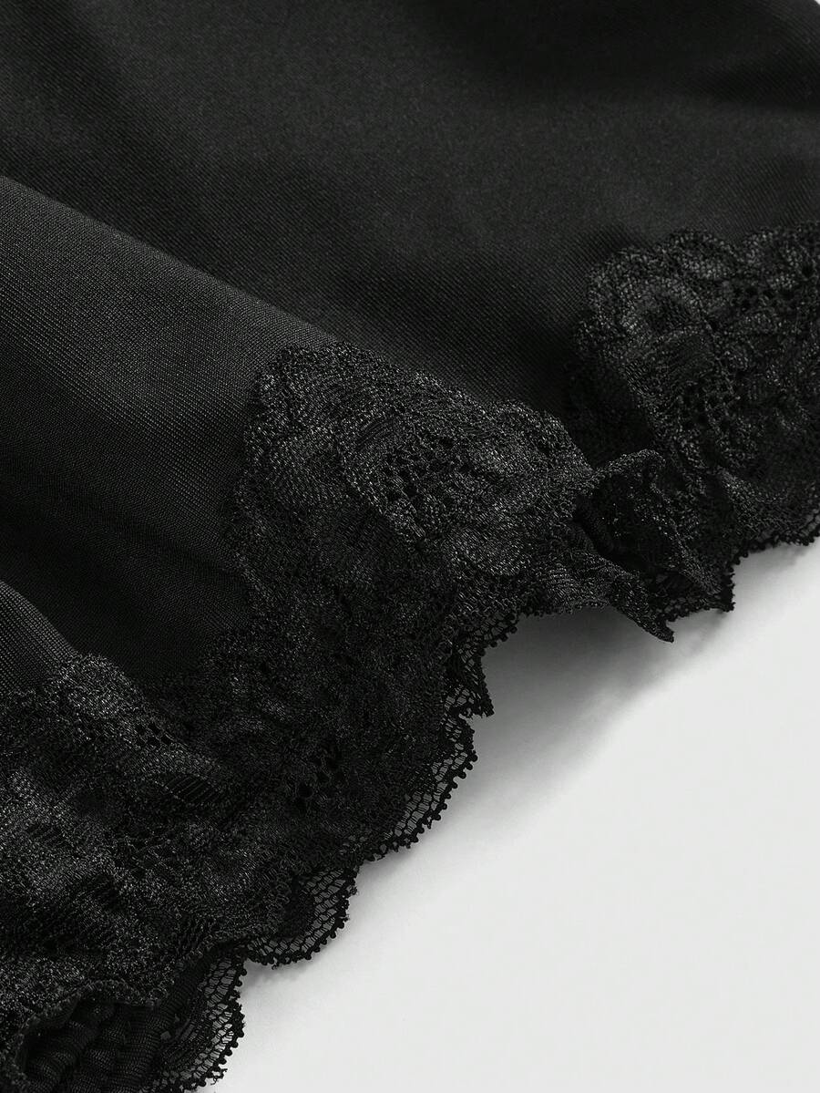 Women's black low-waist mini skirt with drawstring tie, ruched details, lace trim, layered ruffle hem, and asymmetric styling