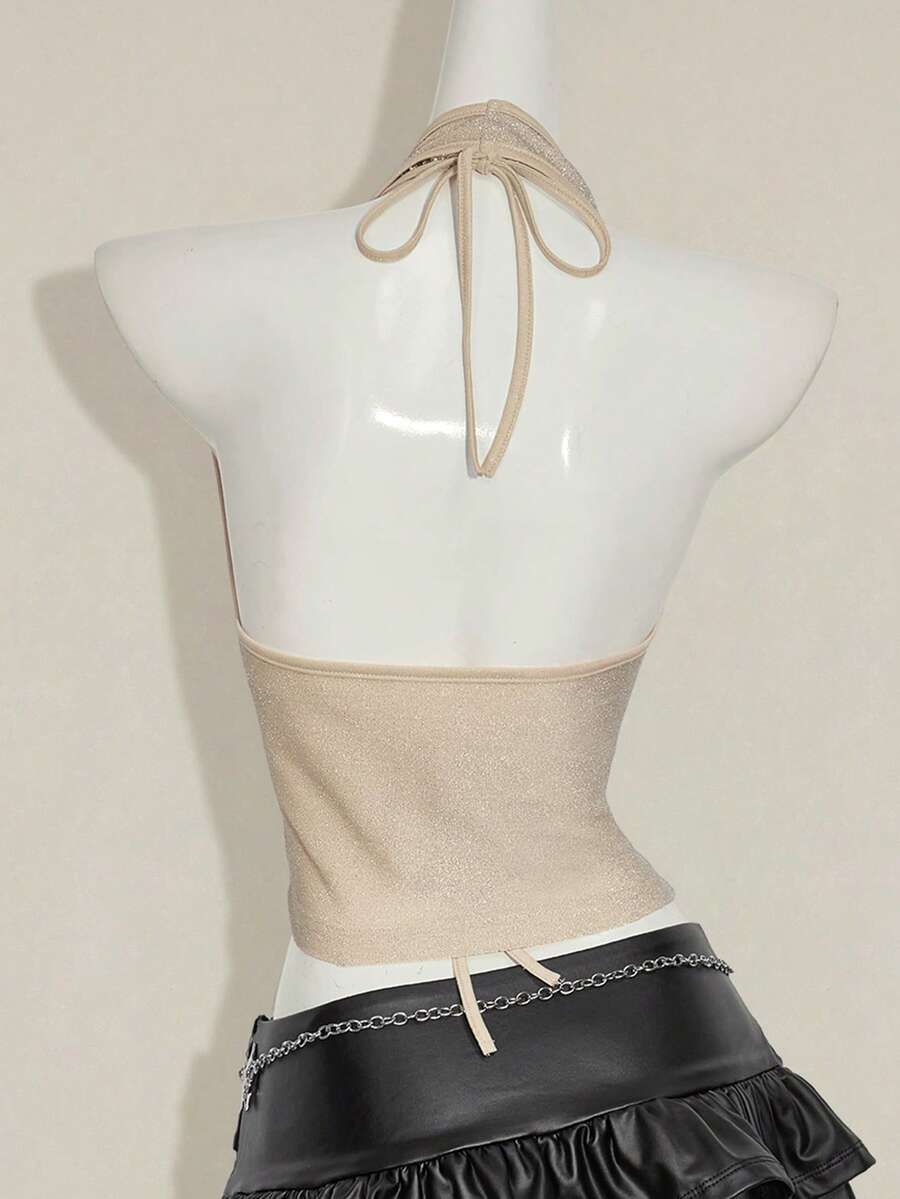 Women's glitter halter backless micro crop tank top featuring a draped knot front design.