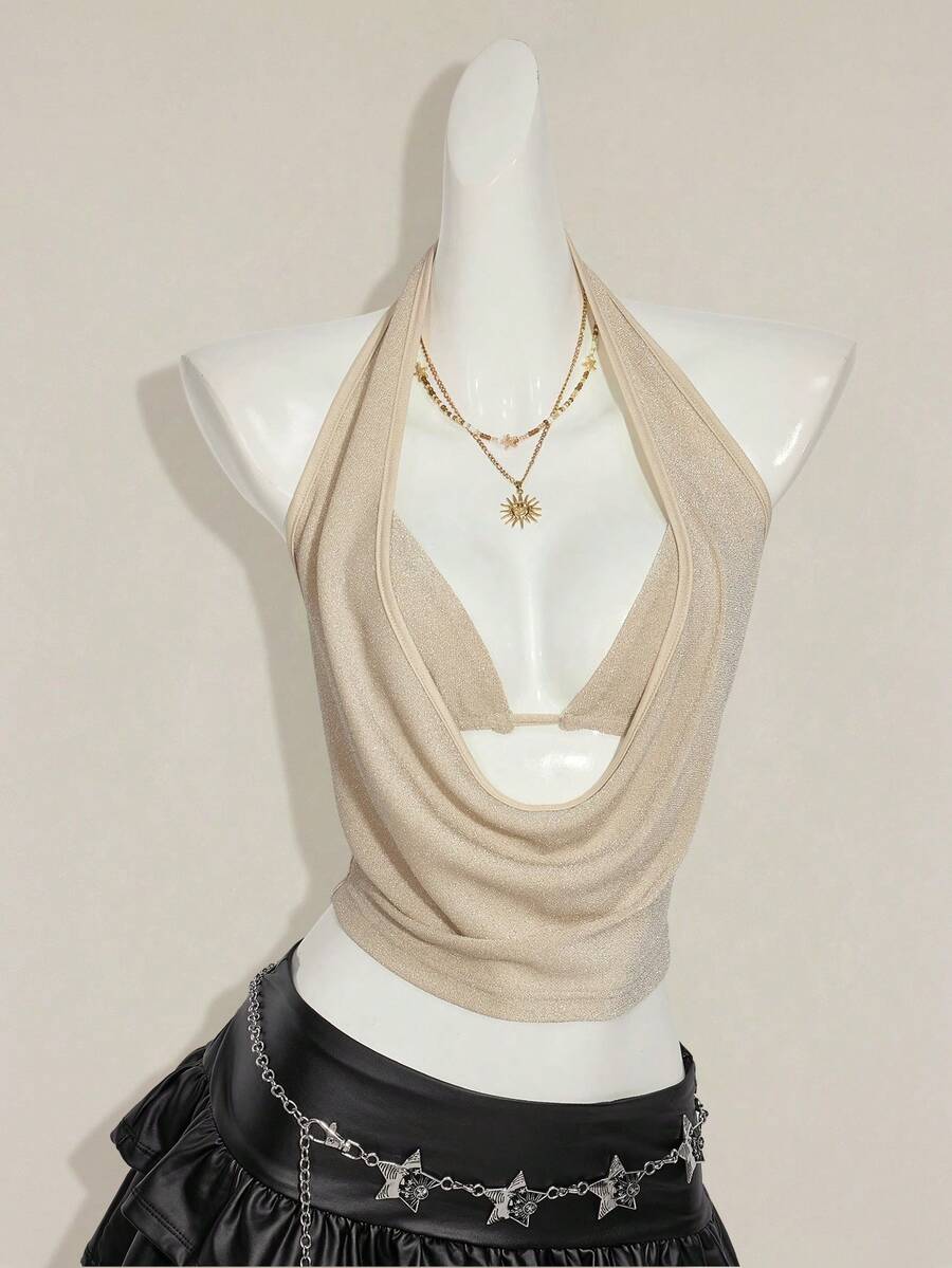 Women's glitter halter backless micro crop tank top featuring a draped knot front design.