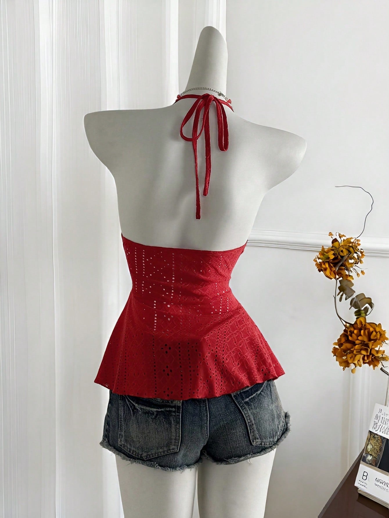 Women's halter crop camisole with textured detail, slim fit, and flared hem for beach vacation and spring or summer wear