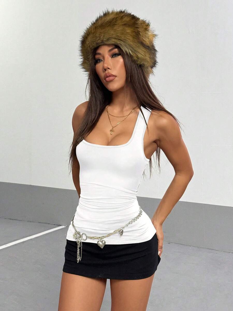 Women's slim fit backless halter tank top featuring ruched details and a plain knitted finish.