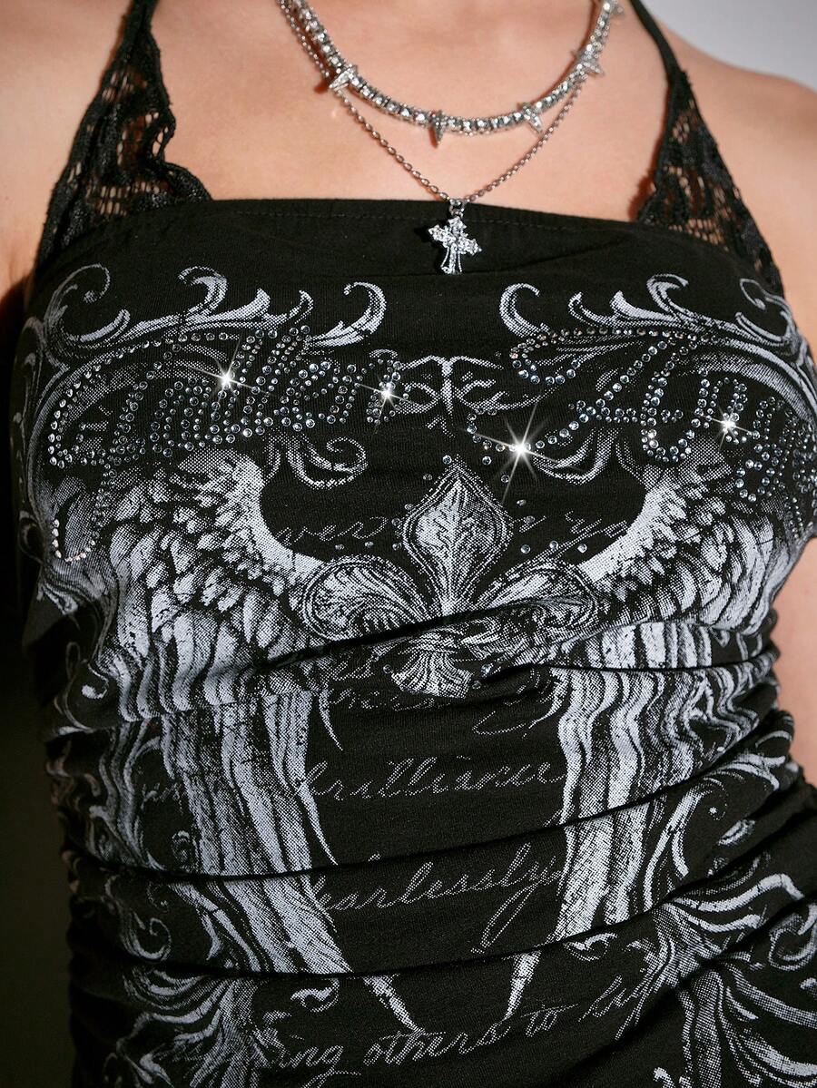Women's cropped Y2K punk print halter cami top with contrast lace, backless knot detail, and slim fit knitted fabric