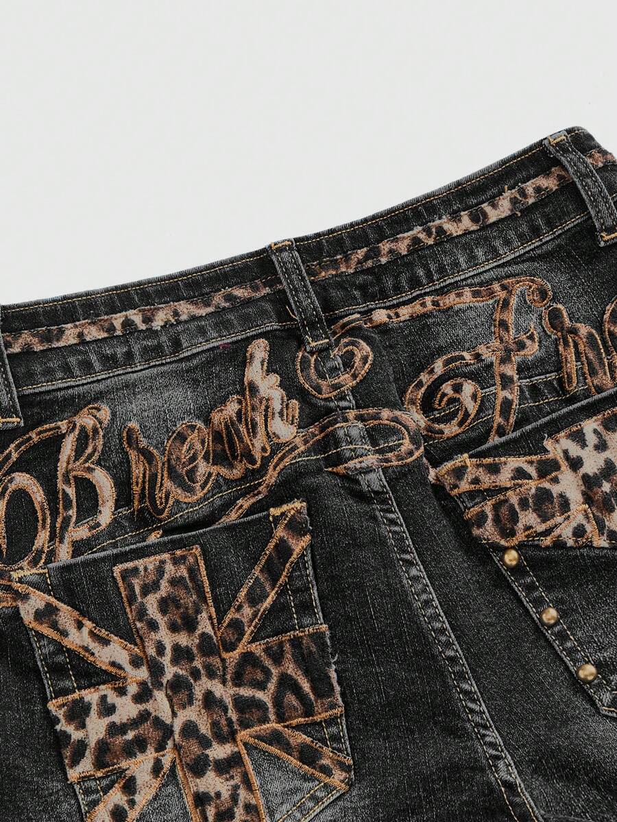 Women's super low waist shorts with leopard print embroidery, button and zipper closure, and raw hem detailing.