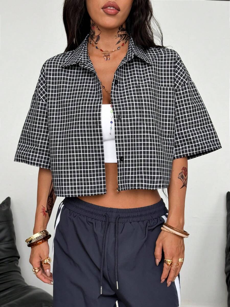 Women's plaid crop shirt with button front, chest pocket, short sleeves, and loose casual fit.