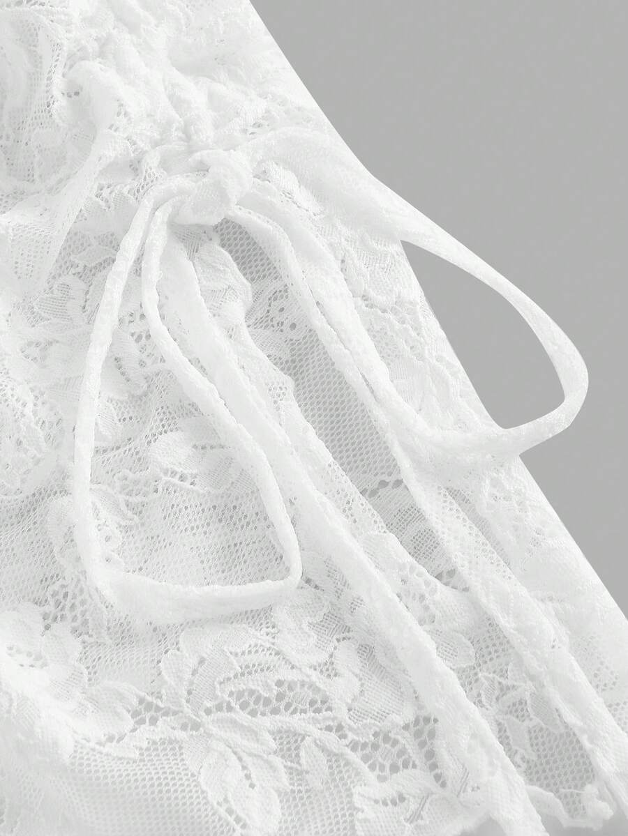 Women's white asymmetrical ruched lace top featuring drawstring details, square neckline, and cap sleeves.