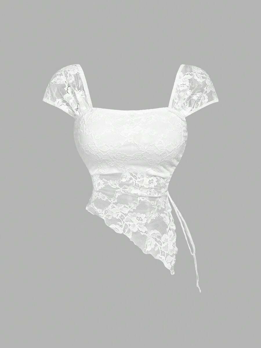 Women's white asymmetrical ruched lace top featuring drawstring details, square neckline, and cap sleeves.
