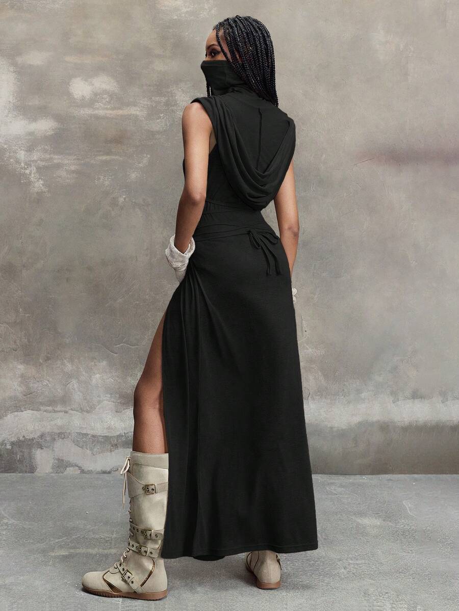 Women's sleeveless hooded maxi dress featuring a plunging neckline, backless design, and high thigh split in a lightweight knit fabric.