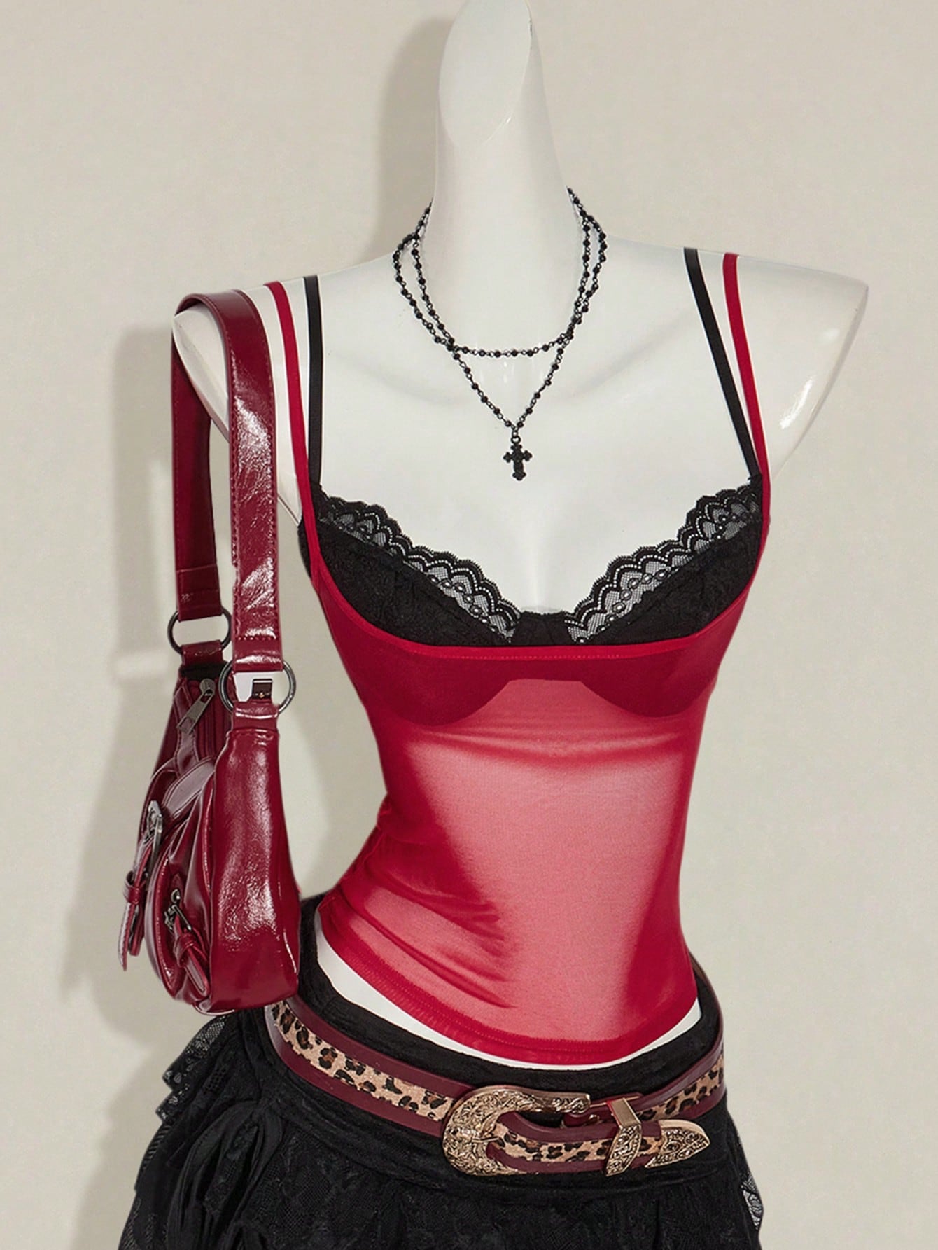 Women's grey leopard print spaghetti strap cami with black contrast lace trim and slim fit design