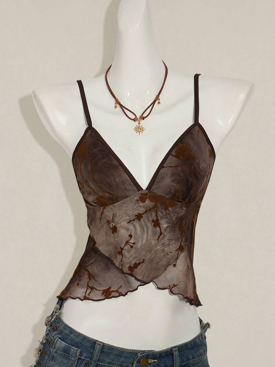 Women's cropped floral flocked camisole with spaghetti straps, backless styling, lettuce trim, asymmetrical hem, and slim fit
