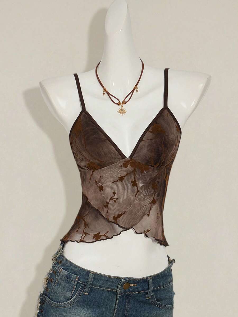 Women's cropped floral flocked camisole with spaghetti straps, backless styling, lettuce trim, asymmetrical hem, and slim fit