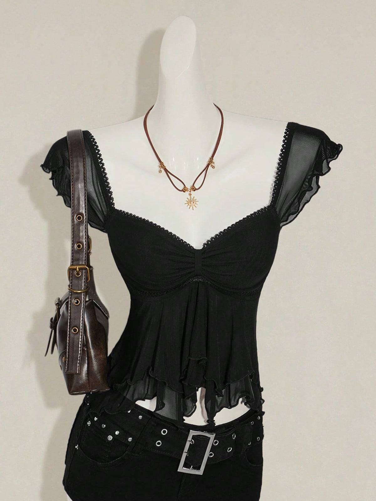 Black slim fit women's ruched front camisole tank top featuring contrast mesh inserts, square neckline, and an asymmetrical crop hem.