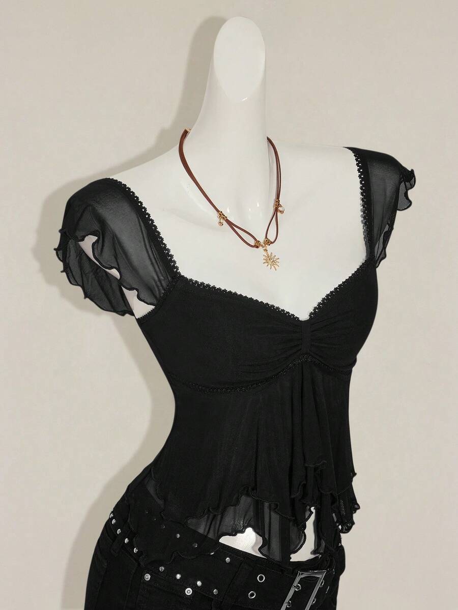 Black slim fit women's ruched front camisole tank top featuring contrast mesh inserts, square neckline, and an asymmetrical crop hem.