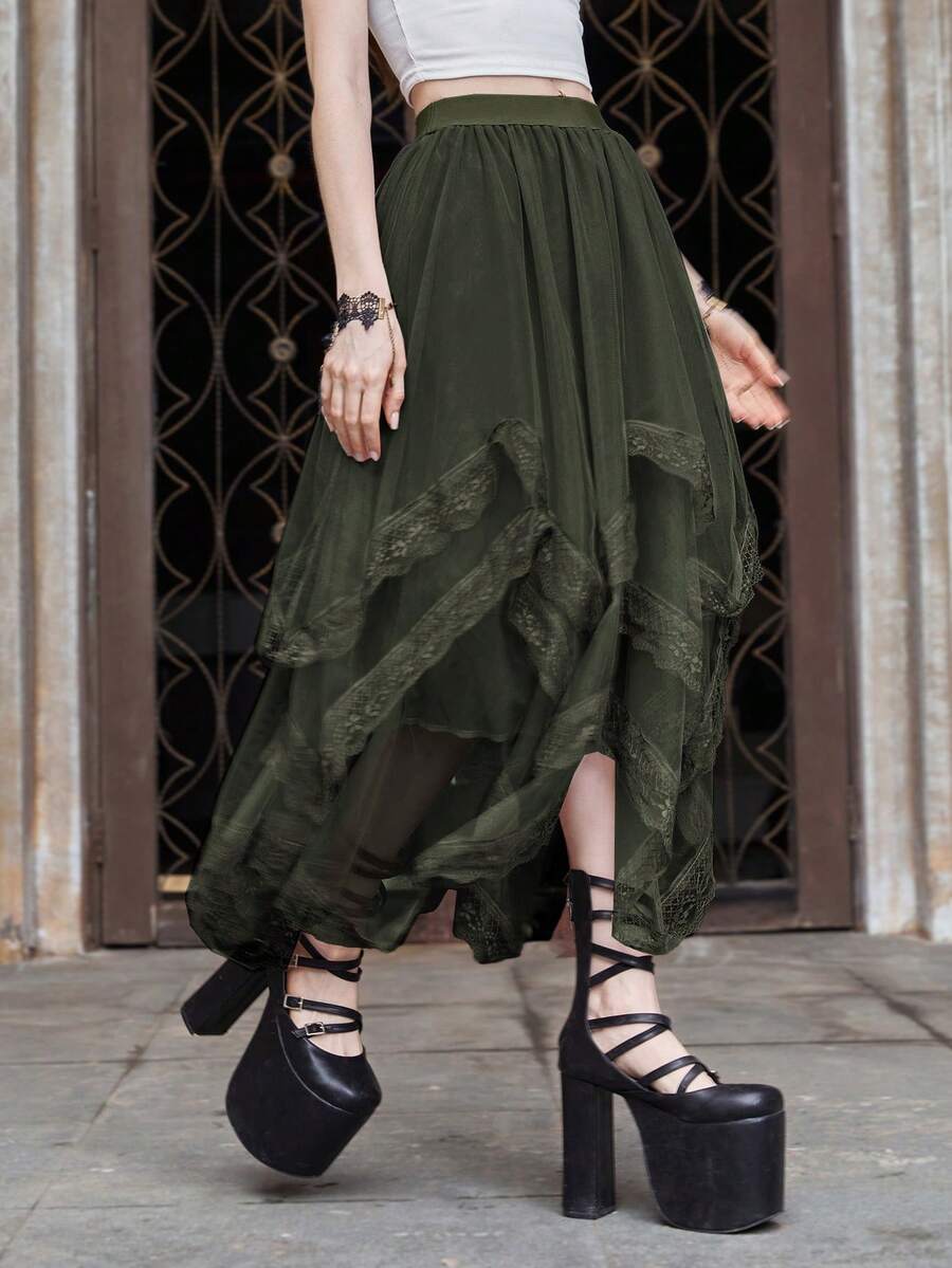Women's asymmetrical high-waist mesh long skirt featuring contrast lace trim and a tiered A-line silhouette.