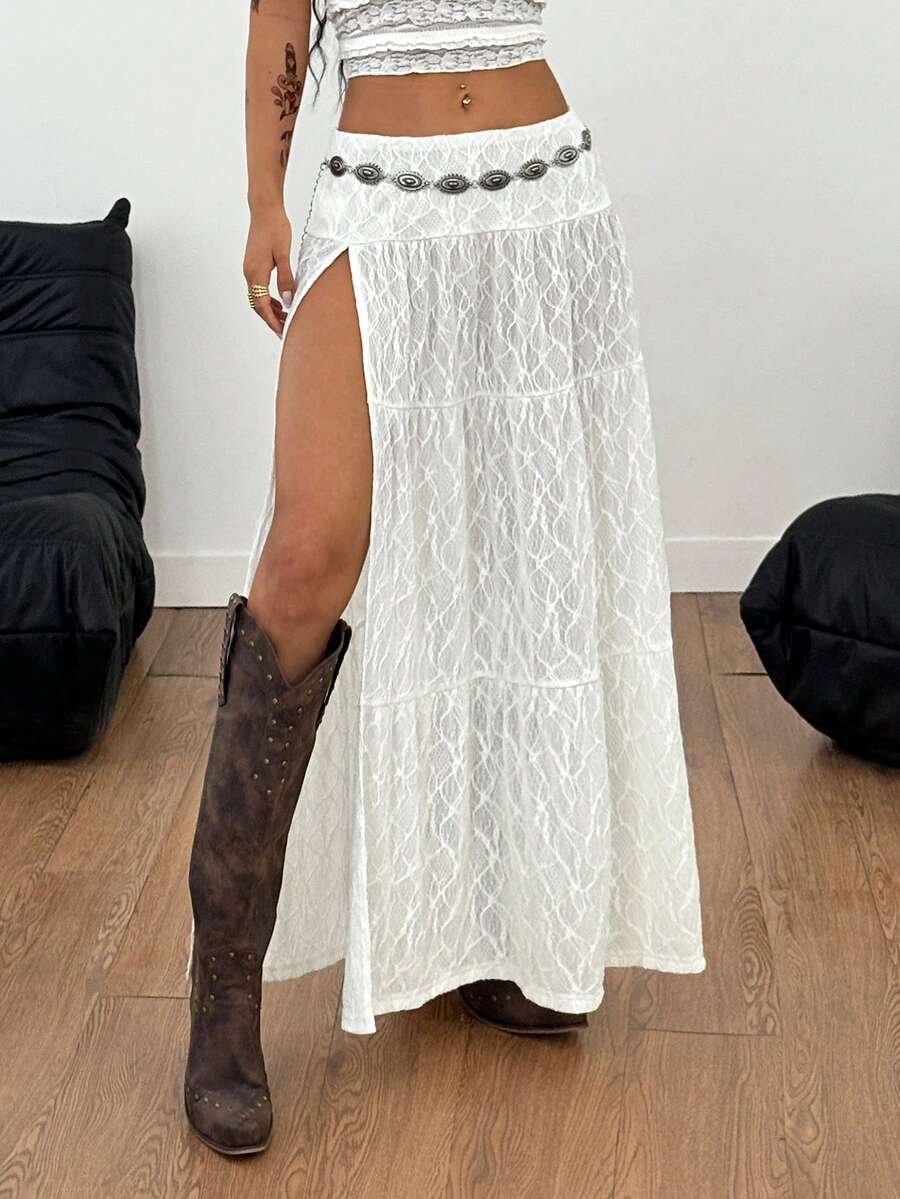Women's red plaid long skirt featuring a low-rise waist and a side slit in lightweight woven fabric.