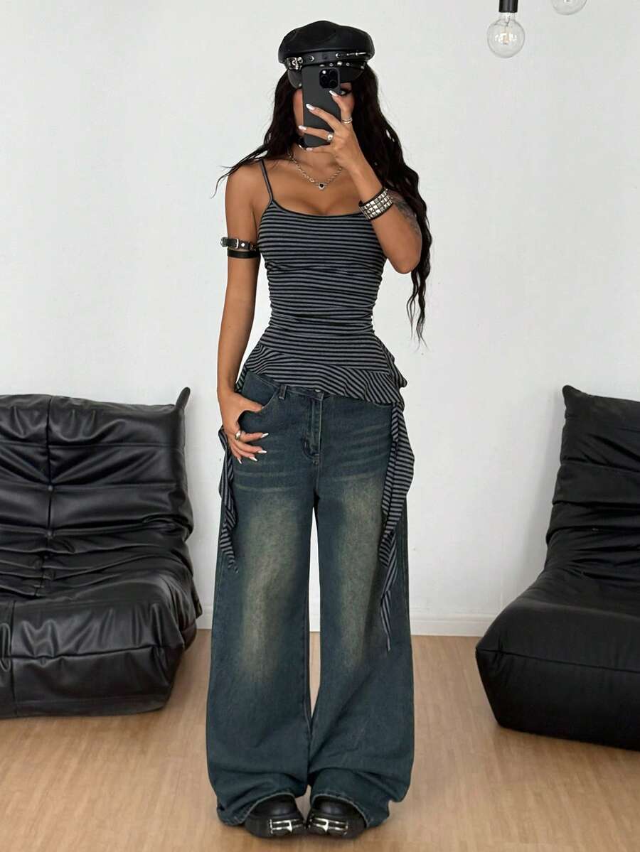Women's slim fit casual cami top featuring spaghetti straps, ruched detailing, and a ruffle hem.