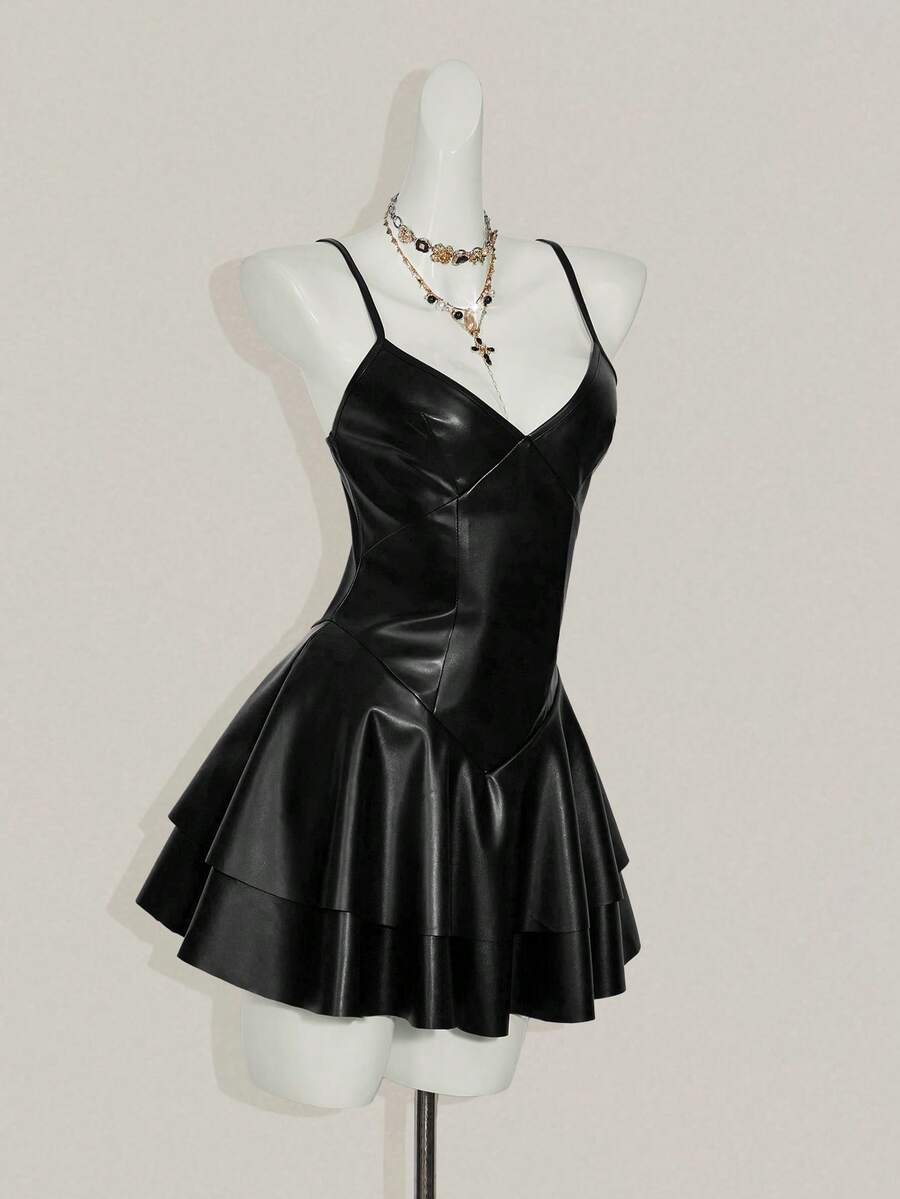 Women's Y2K PU leather mini dress with spaghetti straps, V-neckline, backless design, zipper closure, high waist, slim A-line fit, and layered tiered hem.