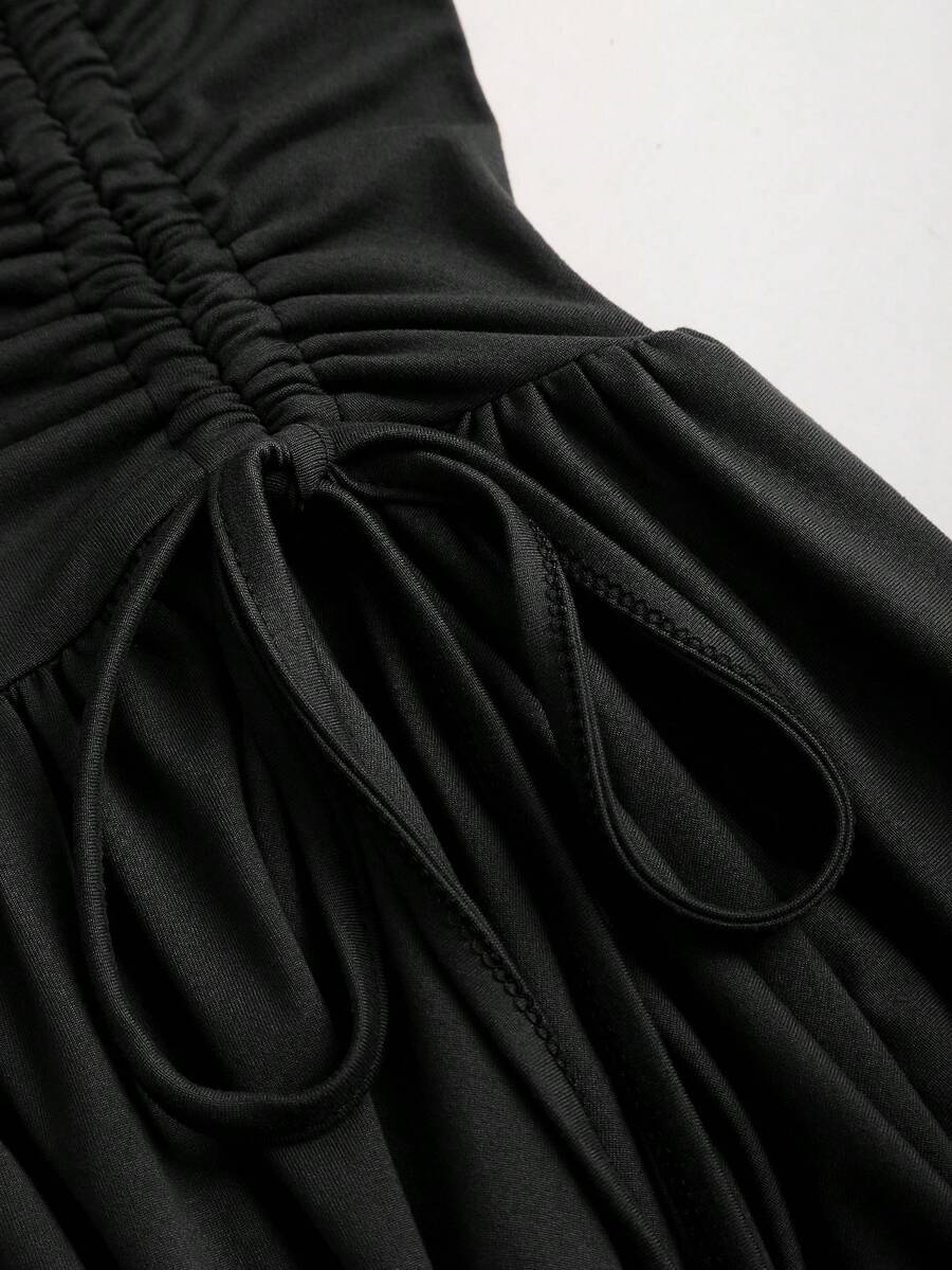 Women's sleeveless halter short dress with a backless design, ruched drawstring detail, slim fit, and asymmetrical hem.