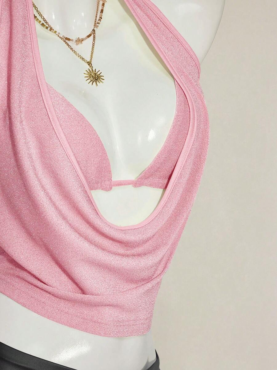 Women's glitter halter backless micro crop tank top featuring a draped knot front design.
