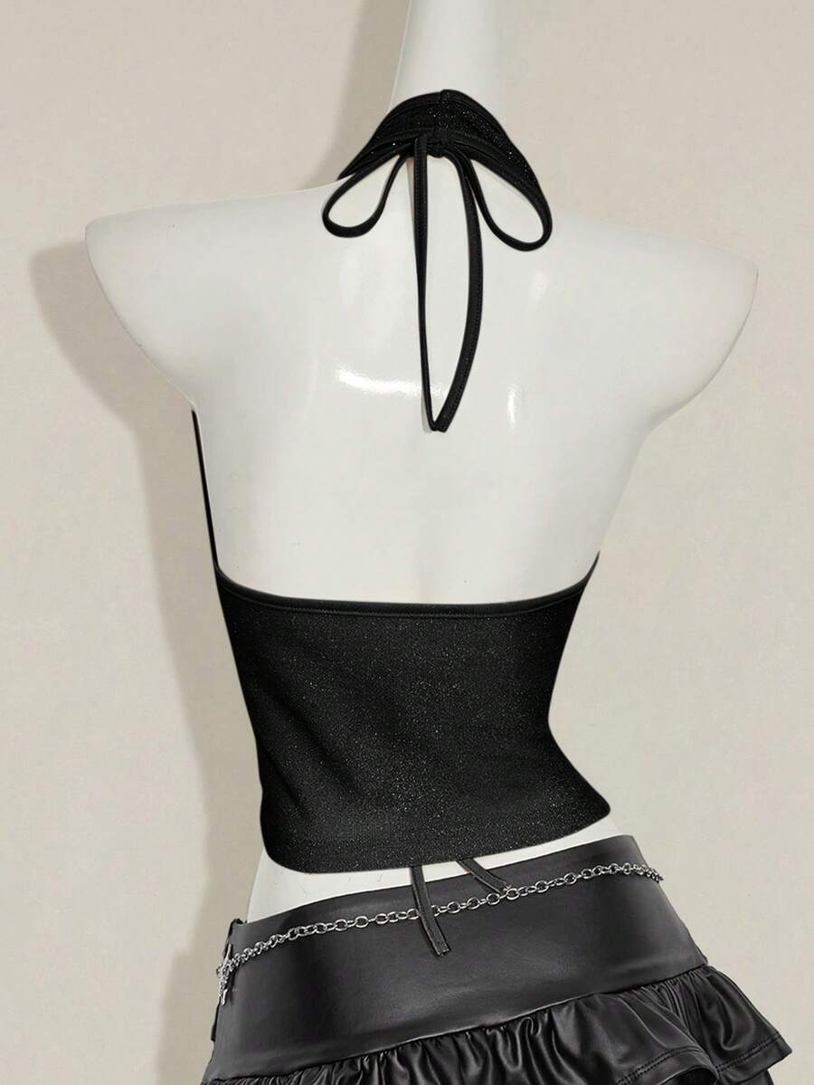 Women's glitter halter backless micro crop tank top featuring a draped knot front design.