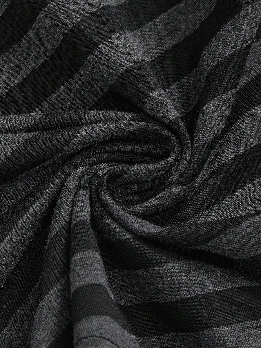 Women's striped strapless tube top featuring ruched detailing, flared hem, and stretchy knit fabric.