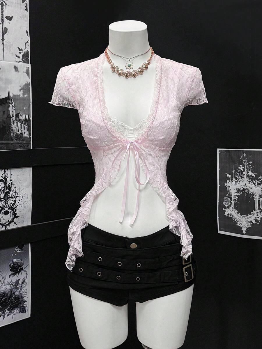 Women's semi-sheer deep V-neck top featuring cap sleeves, contrast lace trimming, and a lace-up front detail.