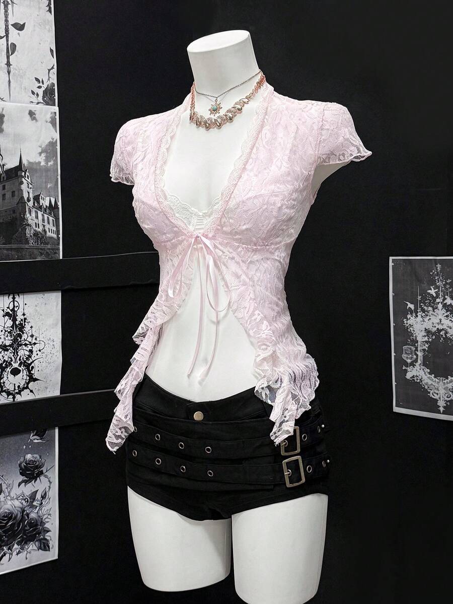 Women's semi-sheer deep V-neck top featuring cap sleeves, contrast lace trimming, and a lace-up front detail.