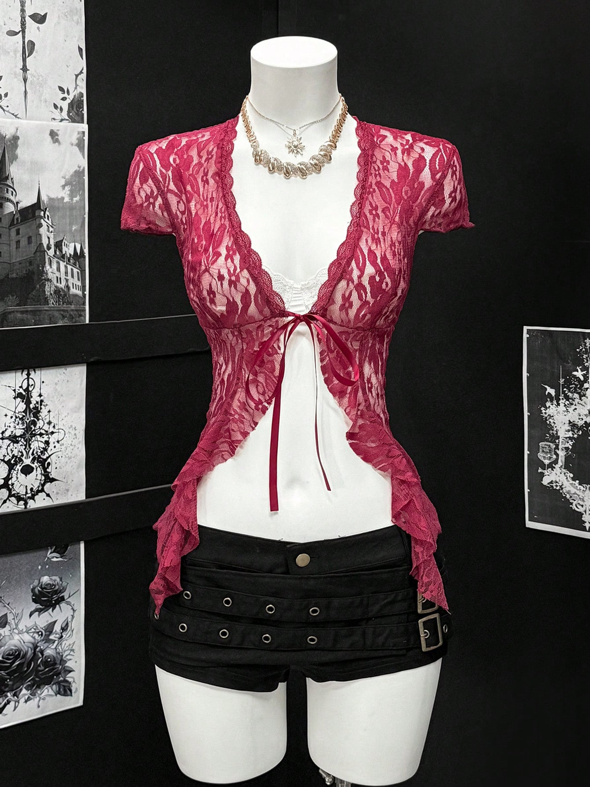 Women's semi-sheer deep V-neck top featuring cap sleeves, contrast lace trimming, and a lace-up front detail.