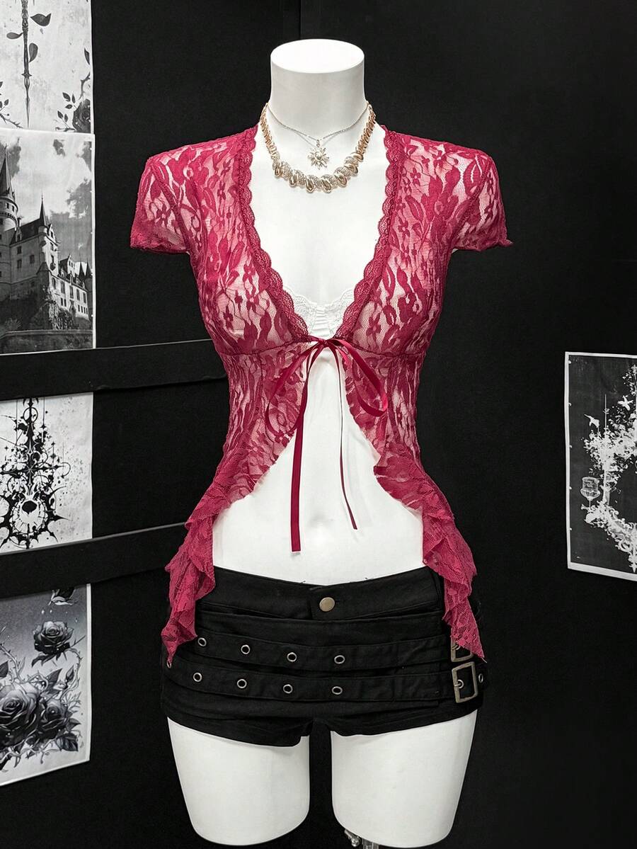 Women's semi-sheer deep V-neck top featuring cap sleeves, contrast lace trimming, and a lace-up front detail.
