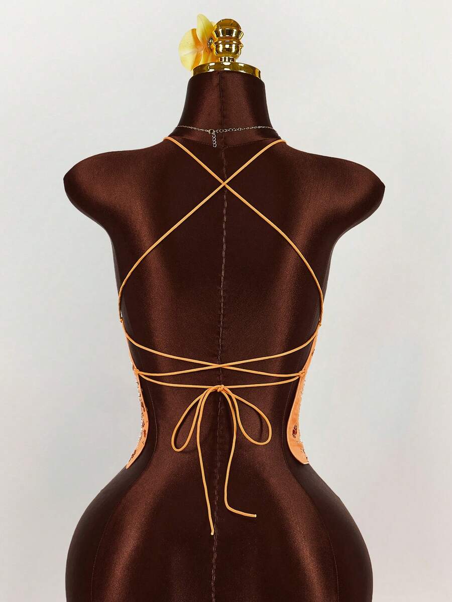 Women's embroidered sequin halter cami top featuring a deep V-neck, backless party design, and slim fit silhouette.