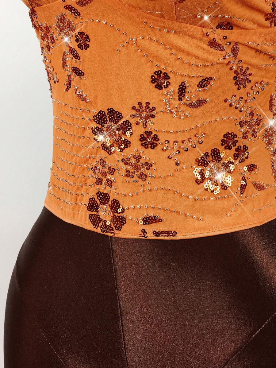 Women's embroidered sequin halter cami top featuring a deep V-neck, backless party design, and slim fit silhouette.