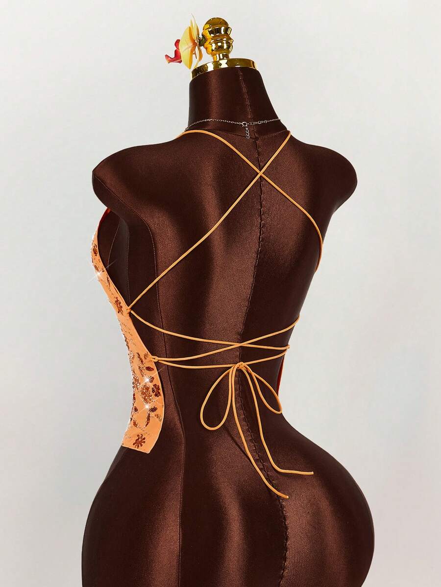 Women's embroidered sequin halter cami top featuring a deep V-neck, backless party design, and slim fit silhouette.