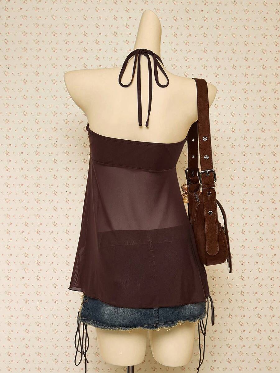 Women's boho halter mesh tank top with asymmetrical hem, semi-sheer finish, lined body, slim fit, and cold shoulder styling.