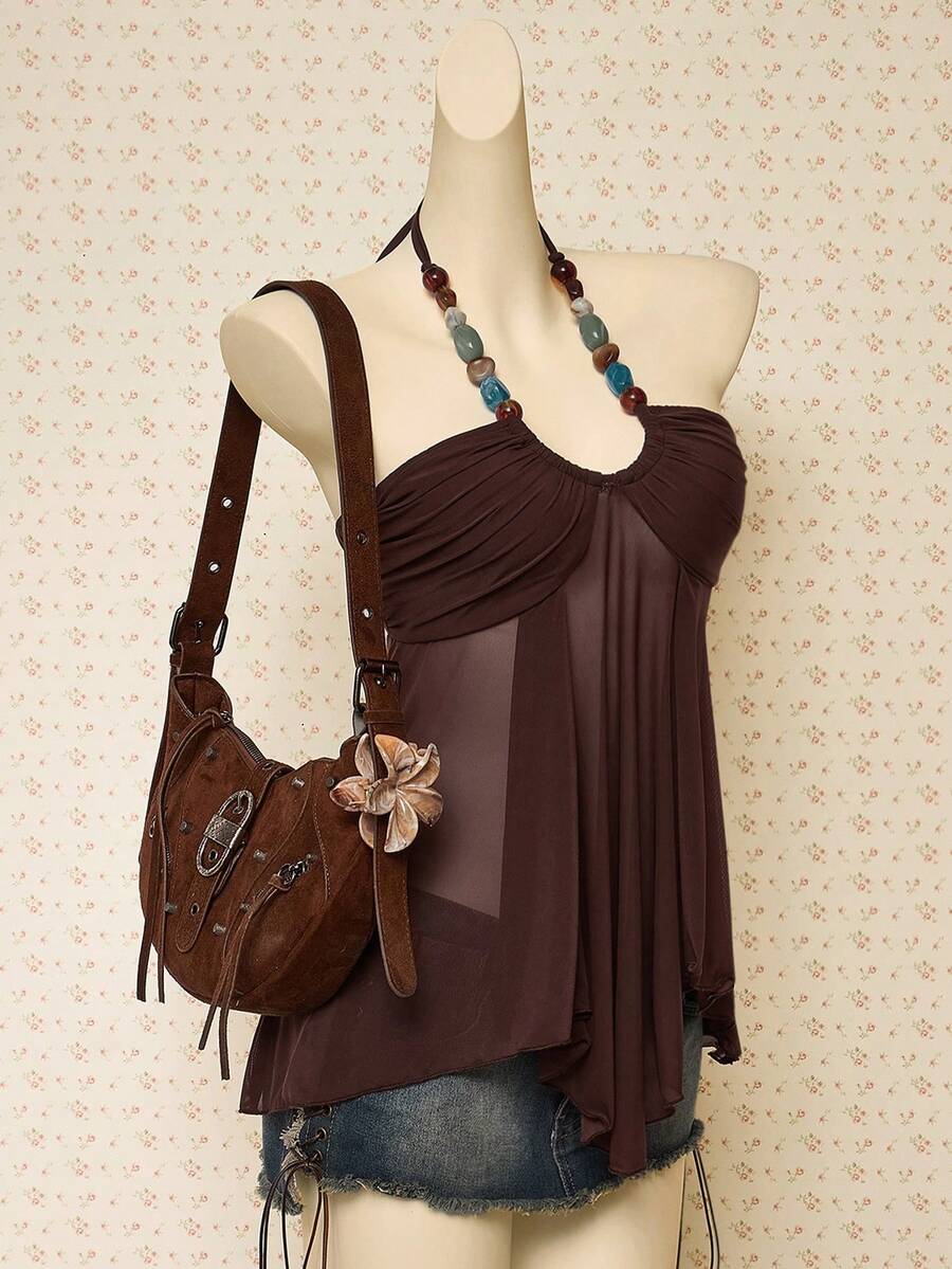 Women's boho halter mesh tank top with asymmetrical hem, semi-sheer finish, lined body, slim fit, and cold shoulder styling.